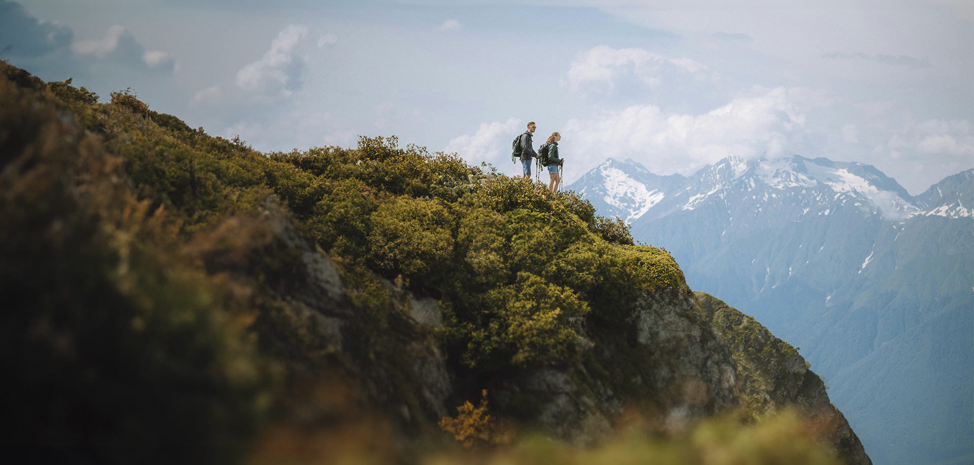 Couple on a mountain starting their journey toward a happier life through counseling in Castle Rock with Authentic Connections.