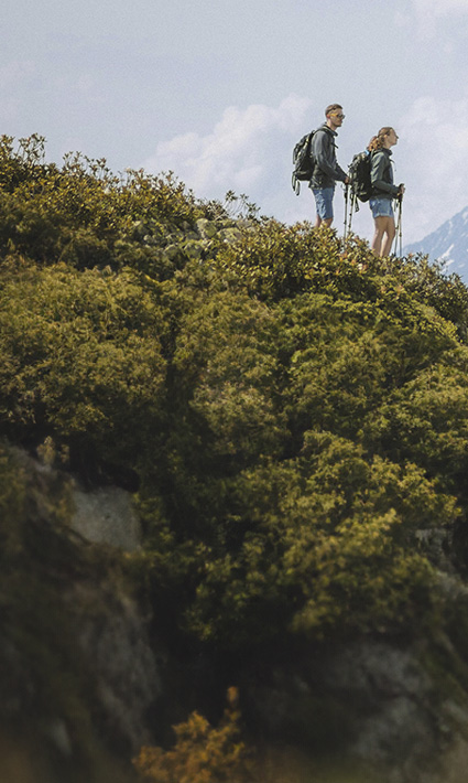 Couple on a mountain starting their journey toward a happier life through counseling in Castle Rock with Authentic Connections.