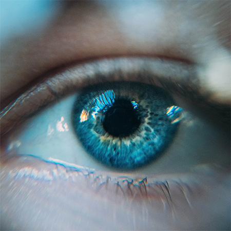 A deep blue eye close-up, representing both the visual stimulation and depth of EMDR Therapy in Castle Rock, CO.