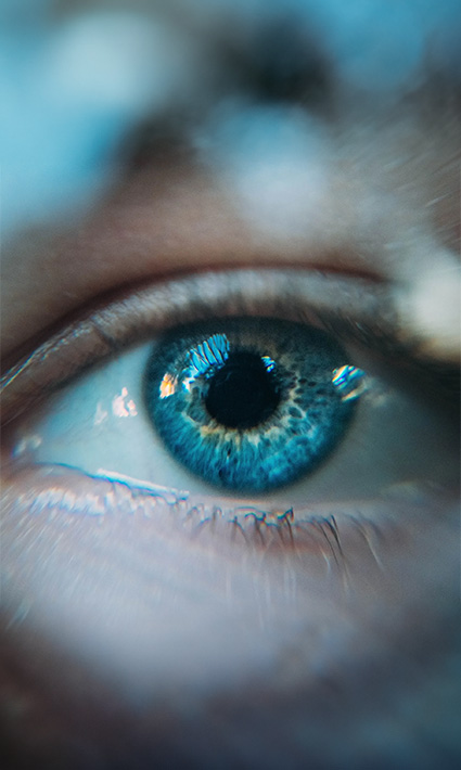 A deep blue eye close-up, representing both the visual stimulation and depth of EMDR Therapy in Castle Rock, CO.