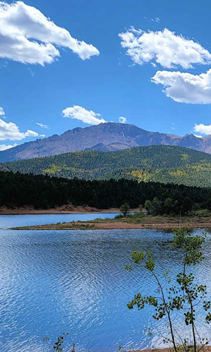 View of a lake in Colorado with the mountains in the background.