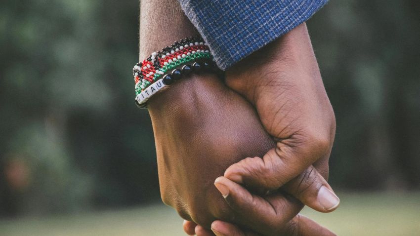 Couple holding hands